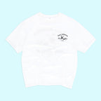 White t-shirt with a small graphic on a light blue background